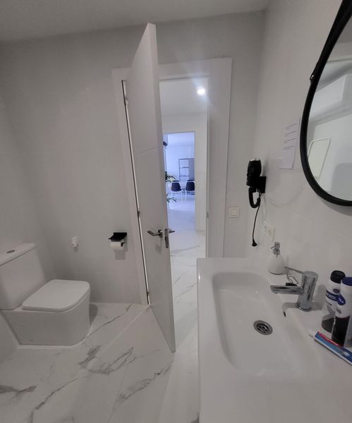 En-suite bathroom with toilet and sink